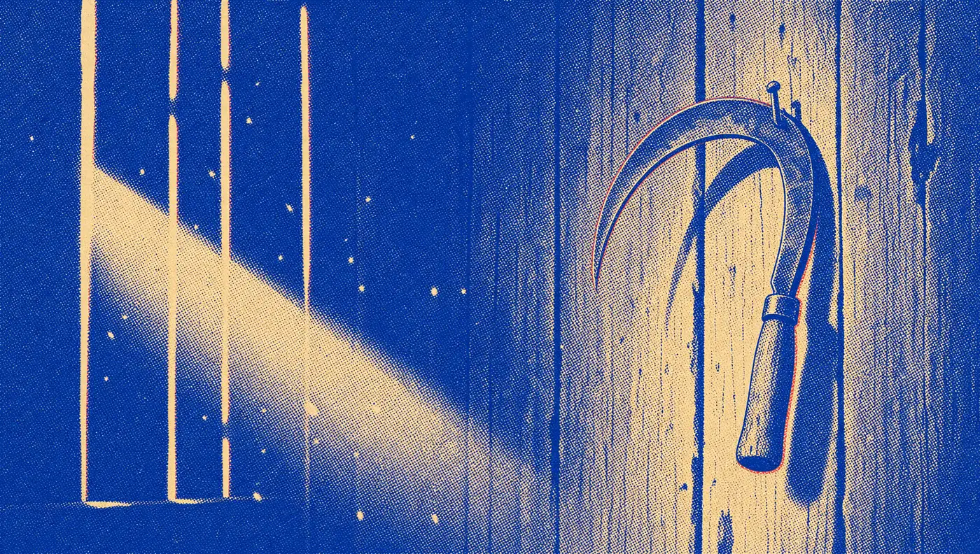 A sickle hanging untouched on a barn wall, a shaft of light falling across the blade